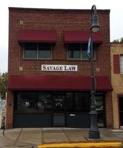 606 S Main Savage Law sign